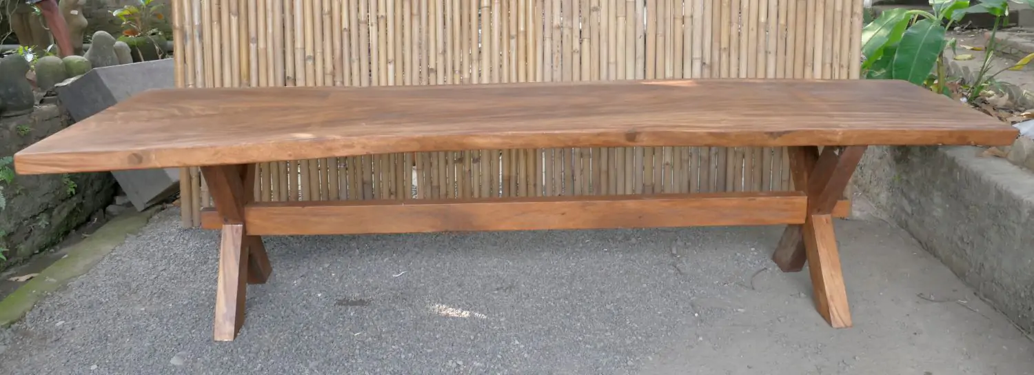  Product image 1 of the product “Natural wood table suar with wooden legs X model, 340cm length, 110cm width, 81cm height. Table top 8cm thickness ”